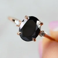 /public/photos/live/Oval Cut Black Moissanite 3 Stone Engagement Ring 999 (1).webp